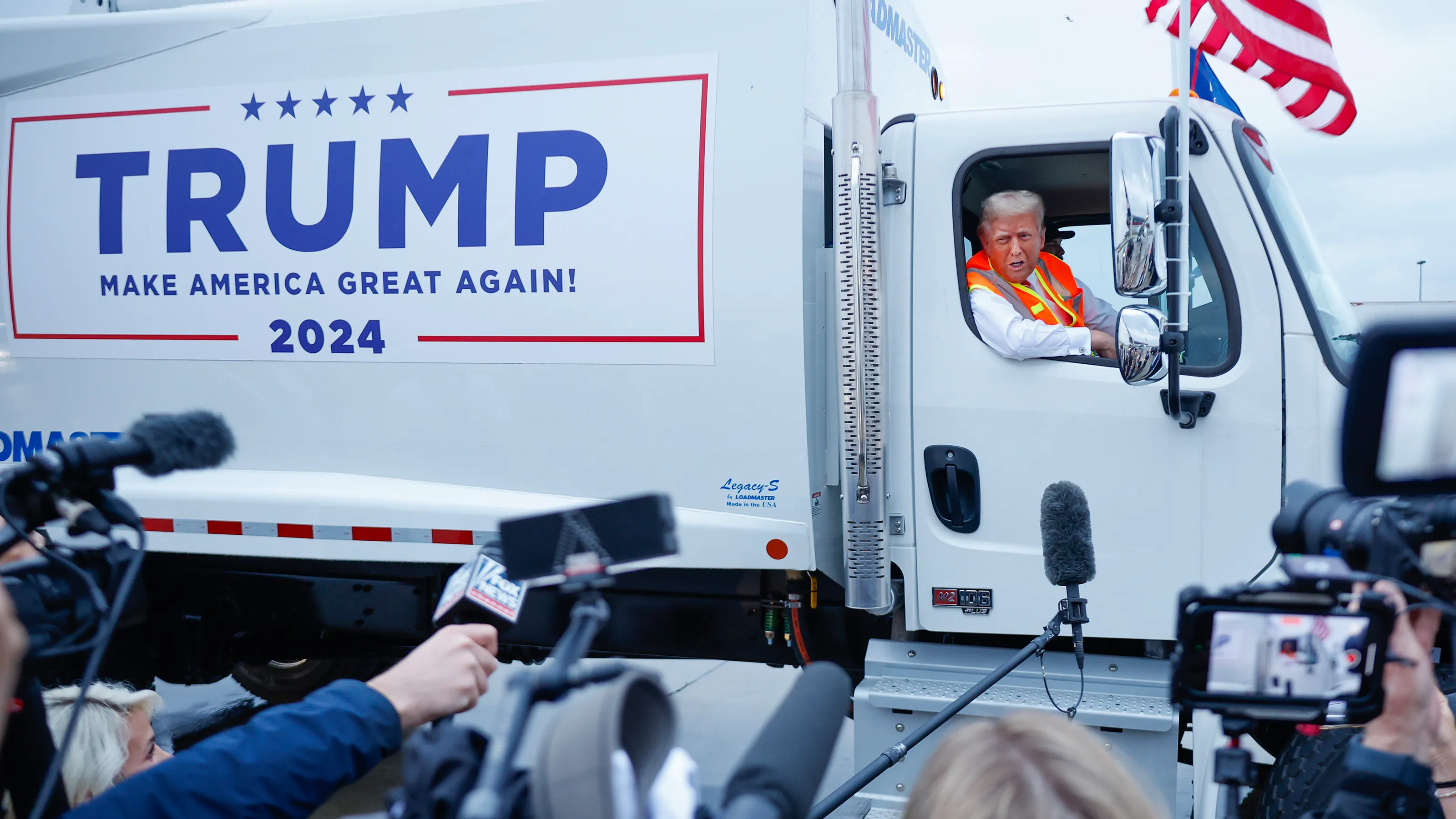 Trump Rides Garbage Truck