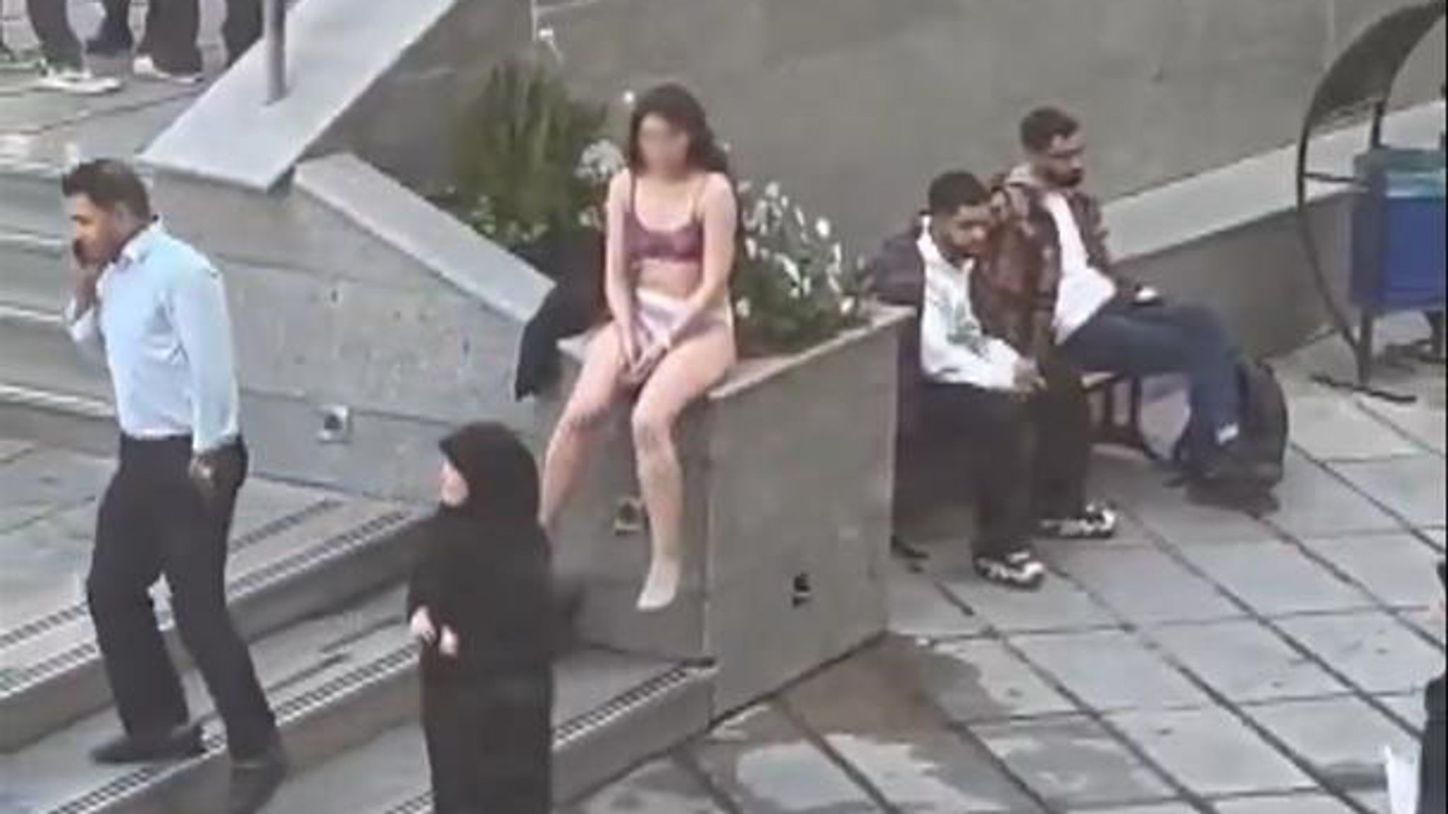 Woman Stripped to Protest Against Strict Dress