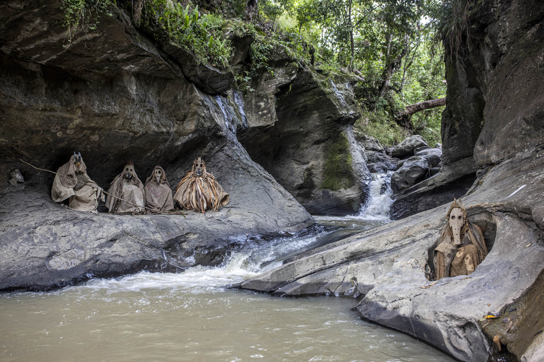 Ghosts Sitting on Waterfall Bank