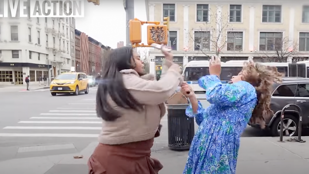 Reporter Punched During Live Interview