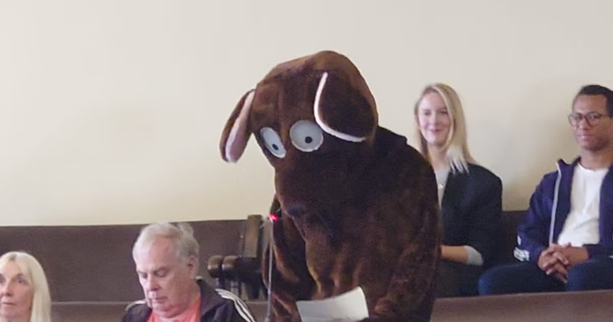 man dressed as giant rat