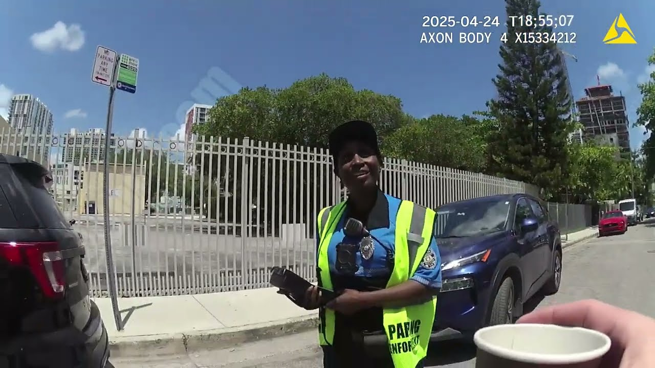 Cop Arresting Female Parking Officer